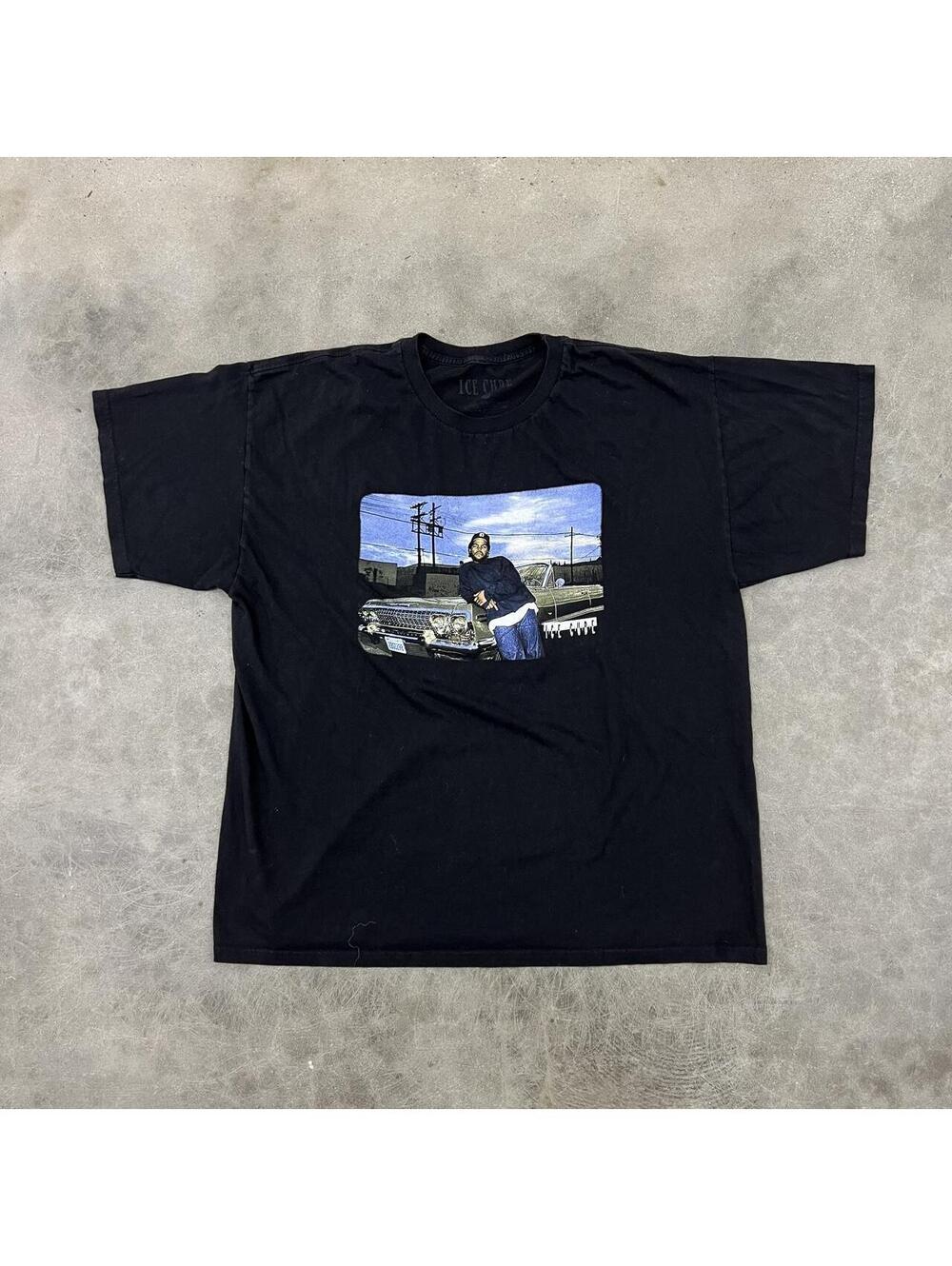 Ice Cube black graphic tee with man leaning against a car #hiphop